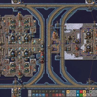 A sprawling Factorio factory base with conveyor belts, pipes, and assembler buildings.